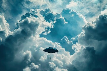 Wall Mural - umbrella in the sky. an umbrella carried by the wind flies in the midst of clouds