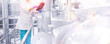 © Parilov - Operator with tablet control process on production factory tanker with milk or beer. Concept quality food industry banner, sunlight