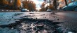 Closeup bad damaged asphalt road with potholes that are dangerous for passing cars. AI generated