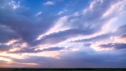 Wall Mural - swirls of dappled clouds create a mesmerizing display in the twilight hours.