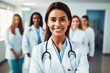 © Ifti Digital - Portrait of a smiling female doctor standing in front of her team, Smiling female doctor standing with medical colleagues in a hospital, AI Generated