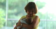 © Marco - Happy grand-mother holding newborn baby infant in arms feeling joy