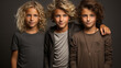 Preteen triplet siblings. Three male brothers posing for the camera. Concept of family genetics, genes, science, multiple pregnancies, assisted fertility, reproduction treatments.