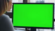 canvas print picture - Call operator using chromakey computer closeup. Corporate manager looking green