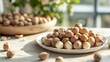 A dish of Macadamia integrifolia, a delicacy known for its premium quality. Nuts, contained in their hard shells, are prized for their crunchy texture and mild flavor.