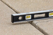 © JJ Gouin - Concrete driveway cracked and settling. Home inspection, slab jacking and sidewalk repair concept.