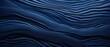 © CrazyJuke - An intriguing abstract closeup of detailed organic dark blue wooden waving waves on a wall, Ai Generated.