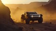 The camera follows the headlights of an offroad vehicle as it treks through a dusty desert landscape highlighting its rugged capability and powerful lighting in harsh environments.