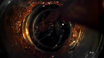 Poster - Pouring black coffee into a glass. Top view. Filmed on a high-speed camera at 1000 fps. High quality FullHD footage