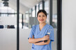 © PRIME STOCK LAB - Confident Medical Professional with Stethoscope in Hospital Setting.