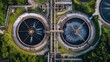 © Naknakhone - Modern wastewater treatment plant of chemical factory. drone view. copy space for text.