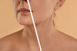 © New Africa - Aging skin changes. Woman showing neck before and after rejuvenation, closeup. Collage comparing skin condition