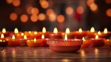 Traditional Earthen Diya Lamps Glowing Warmly Amidst A Festive Celebration, With Scattered Petals.