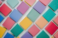 free stock photos of colorful book and different colors of book scattered