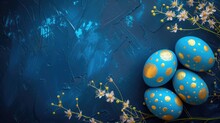 Beautiful Painted Blue Easter Eggs With Golden Decorations On Dark Blue Table Top View, Greeting Card, Banner Format.