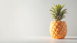 Creative studio photograph of a cup designed in the shape of a juicy pineapple