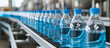 Drinking water production plant, bottles on a factory conveyor with an automatic line for packaging drinking water in plastic containers.