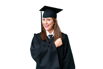 Wall Mural - Middle age university graduate woman over isolated background celebrating a victory