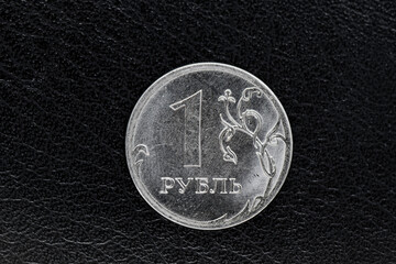 Wall Mural - Money. One russian rouble coin, close up, black background