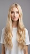 © Izhar - a young lady isolated against a white background with long, straight, silky blonde hair