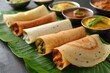 South Indian food served on banana leaf with chutneys