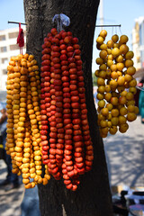 Sticker - red and yellow hawtorn fruits, hangind on tree