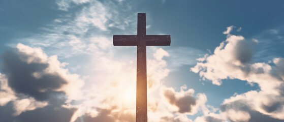 Wall Mural - the cross of christ in a beautiful sunset - concept of giving hope
