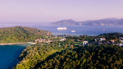 Wall Mural - Paradise beach Phuket Patong. aerial top view amazing freedom beach small white sand beach with perfect nature. white wave hit the rock around island. green forest peaceful. green sea, landscape.