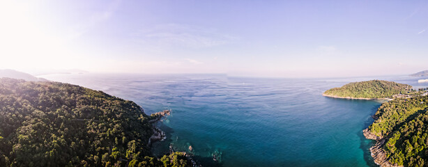 Wall Mural - Panorama Paradise beach Phuket Patong. aerial top view amazing freedom beach small white sand beach with perfect nature. white wave hit the rock around island. green forest peaceful. green sea.