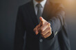 © thanaboon - business man points his finger at you