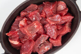 Fototapeta Tulipany - Cutting beef in iron plate