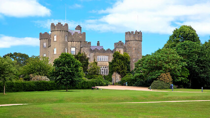 Canvas Print - Medieval Malahide Castle with green front garden, Dublin County, Ireland