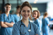 © Nataliia_Trushchenko - female doctor nurse portrait shot smiling cheerful confident standing front row in medical training class or seminar room background. Medical, professional and portrait of a happy female doctor