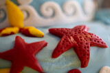 Fototapeta Mosty linowy / wiszący - starfish and shells cake