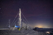 Ceahlau weather station in Romania. Night scene with stars in winter