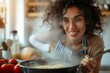 © LifeMedia - A woman's determined face as she skillfully stirs a pot of bubbling tomato soup in her cozy kitchen, surrounded by hanging kitchenware and a colorful mixing bowl
