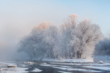 Wall Mural - Kuerbin rime sunrise landscape in Yichun city Heilongjiang province, China.