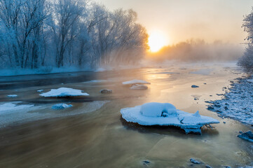 Wall Mural - Kuerbin rime sunrise landscape in Yichun city Heilongjiang province, China.