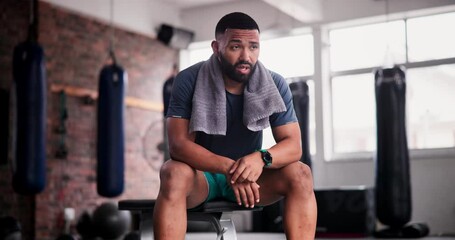 Canvas Print - Gym, break and tired man with towel, pause or breathing for recovery from intense performance. Sports, burnout or male athlete sweating from physical challenge, workout or training, fatigue or rest