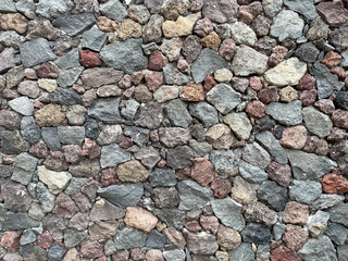 The background of the stone chip wall is composed of natural colors and gray walls. copy space background concept