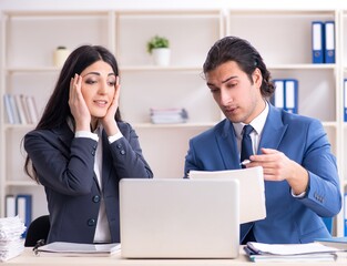 Wall Mural - Two employees working in the office