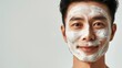 © mariiaplo - Portrait of an Asian man with a white facial mask