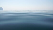 Sea Water Surface. Low Angle View From Kayak, Camera Flies Over Clear Sea Water. Nobody. Holiday Recreation Concept. Abstract Nautical Summer Ocean Nature. Slow Motion. Close Up. Vertical Video