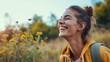 © Lakkhana - Side view portrait of overjoyed happy young adult woman smiling and having fu laughing in outdoor leisure activity alone with nature in background. Traveler and tourist. People outside enjoying life