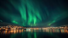 Northern Lights Over The Night City On The Coast