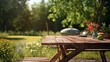 © Jūlija - An empty table with a barbecue in anticipation of a summer picnic