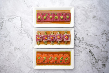 Wall Mural - Tuna appetizer with soy sauce. Japanese tiradito tuna, salmon