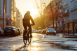 Active Urban Cyclist Riding Bicycle on City Street at Sunset