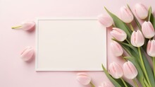 A Charming Display Featuring An Empty Photo Frame Adorned With Pink Tulips, Creating A Delightful Space For Adding Text Or Personalized Messages.