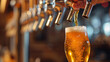close-up shot captures a person's hand holding a freshly poured glass of beer with a tap system in the background